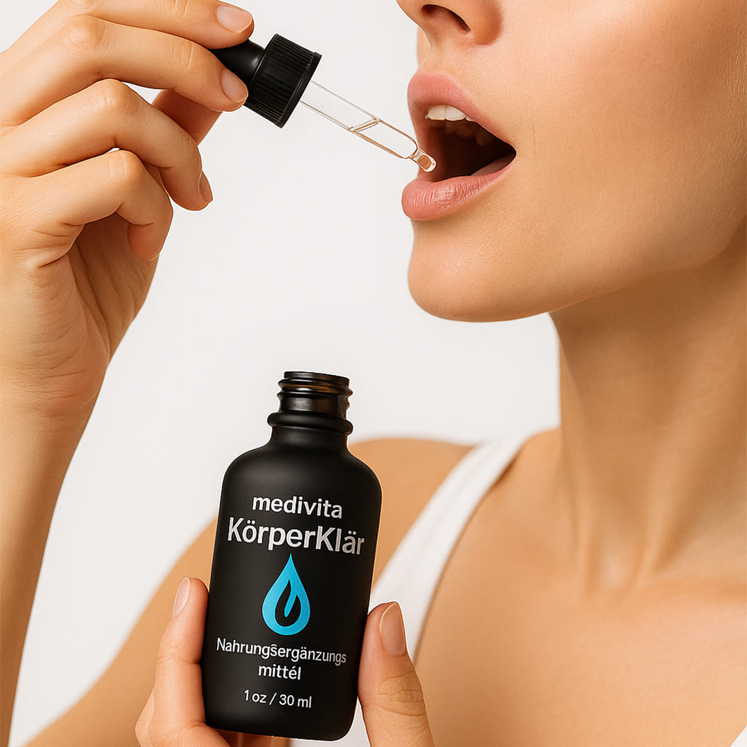 Person using Medivita KörperKlär detox drops for natural body cleansing and an active metabolism.