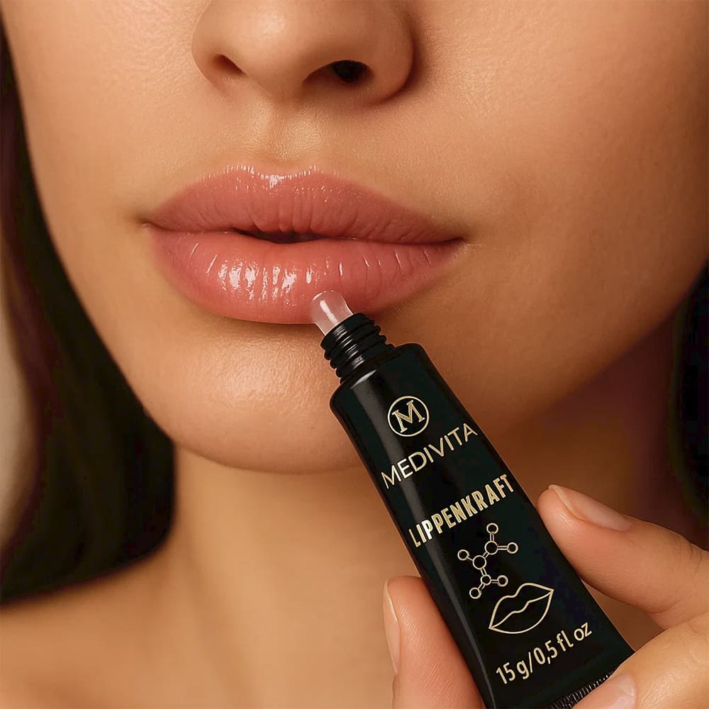 Medivita Lippenkraft lip enhancer being applied to lips for visible volume boost and hydration with hyaluronic acid and Vitamin E.